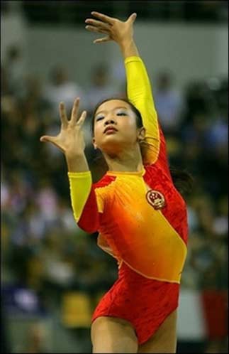Gymnast Cheng Fei competes in the floor exercise during the women's apparatus final of the 39th Artistic Gymnastics World Championships at the Arena in Aarhus. China lay the groundwork for the 2008 Beijing Games by bringing their tally to an unprecedented eight titles on the final day of the world gymnastics championships.(AFP