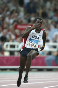 Who is the fastest man in Athens 2004?