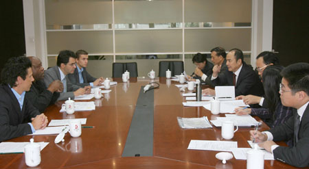 Officials meet Olympic Truce Center Director