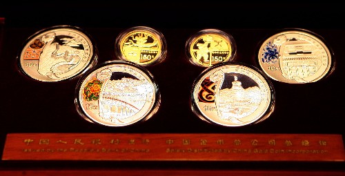 China unveils more Olympic coins