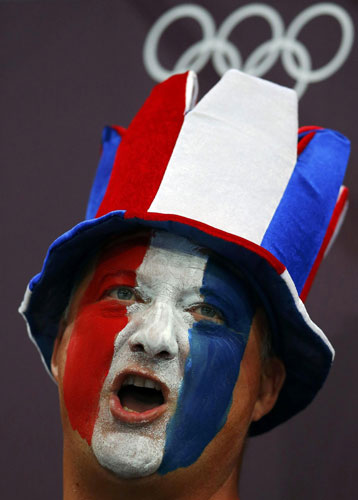 Painted faces of Olympic fans