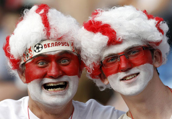 Painted faces of Olympic fans