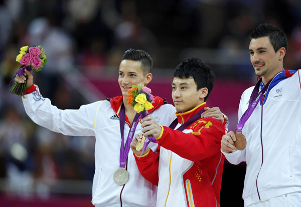 Feng wins third gymnastics gold for China at London Olympics