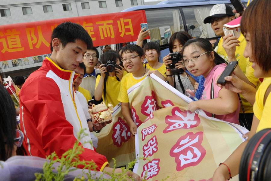 Olympic heroes receive warm welcome