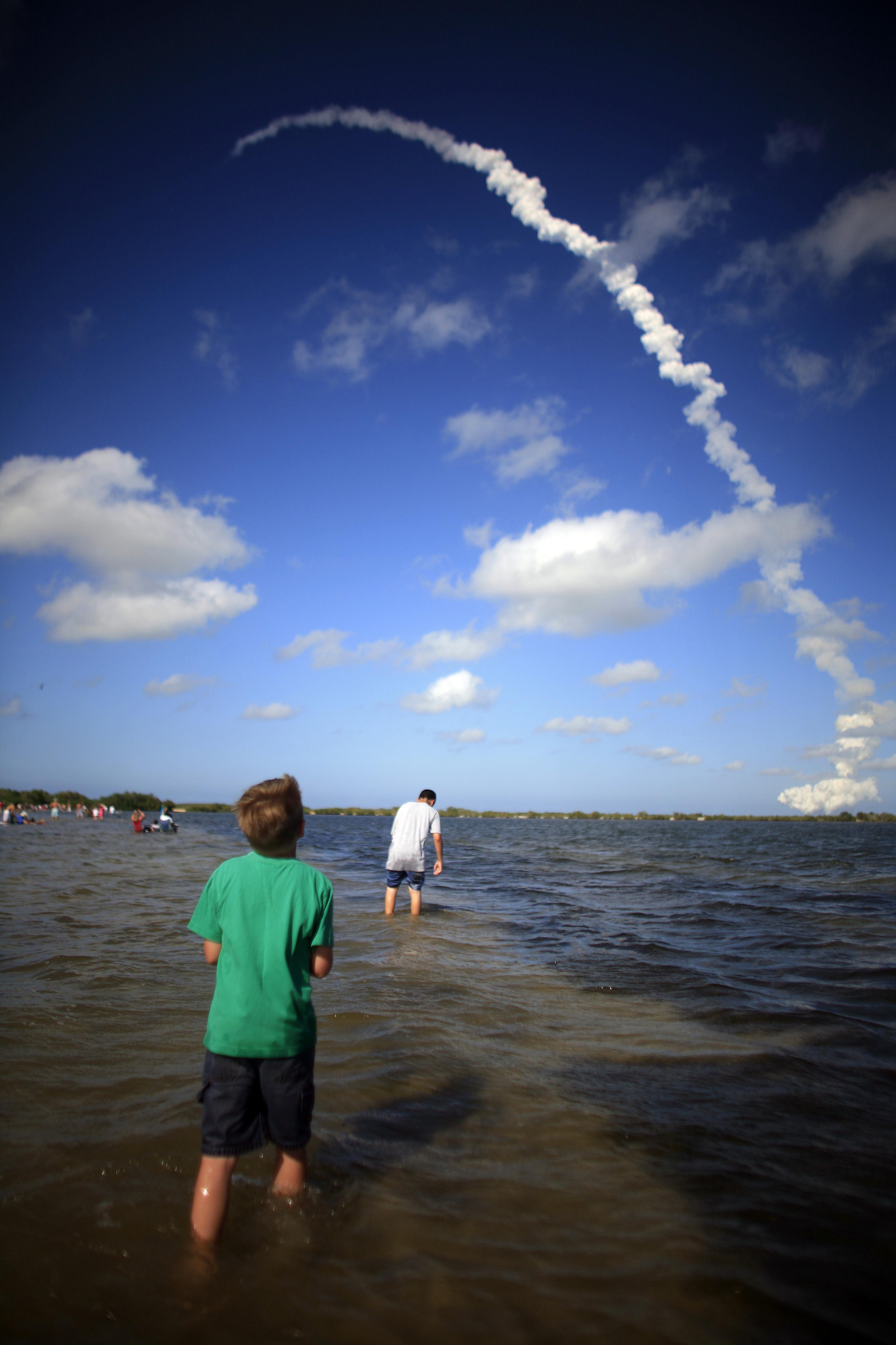 Space shuttle Discovery lifts off, bringing 'hope