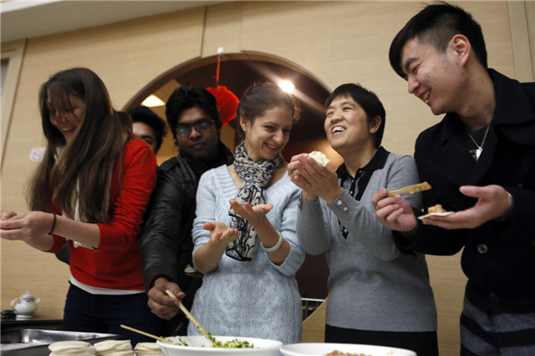 Foreigners feasting on festive delights