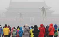 Beijing issues alert as smog smothers N China