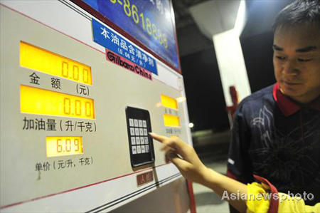 China raises prices of oil, electricity