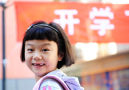 China lifts tuition fees for compulsory schooling