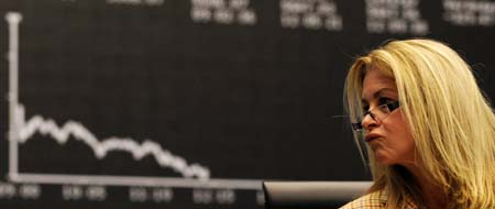 Dow finishes below 10,000 for first time since '04