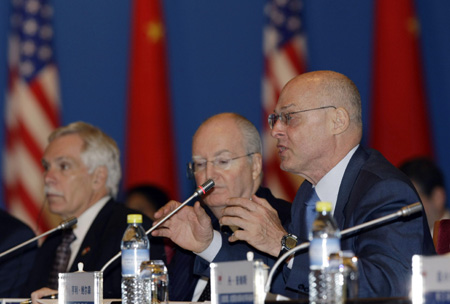 Wang: China, US should work together in financial storm