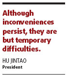 Hu pledges warmth in quake zone