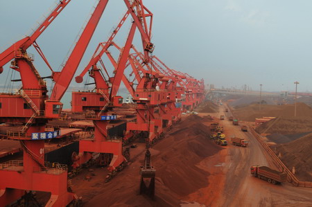 Pressure on China to end ore impasse