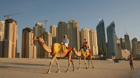 Dubai debt woes may trigger correction