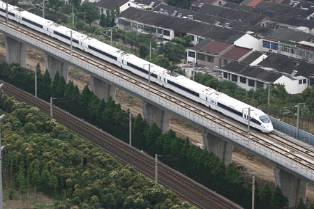 China cuts train speeds, ticket prices