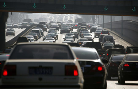 China 2011 car sales rise at slowest annual pace
