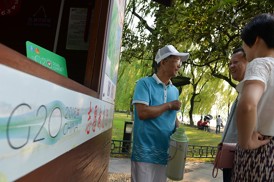 64-year-old volunteer serve tourists before G20 summit