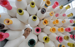 Zhejiang silk firm weaves plan for growth