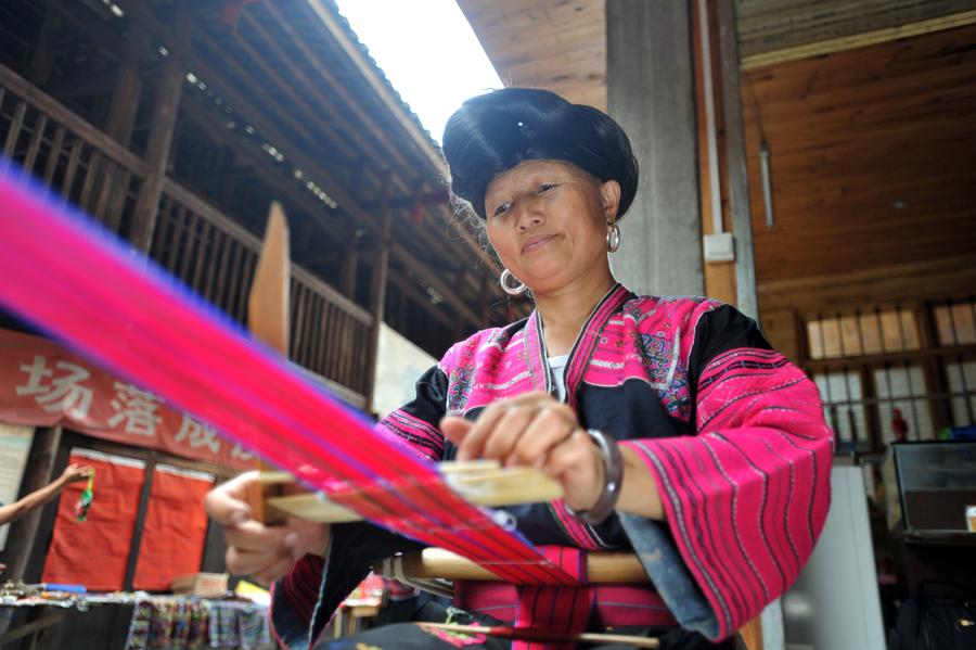Weaving profits, tradition with hand-made dresses