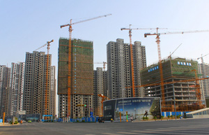 China's rich look abroad as home prices fall, others stay put
