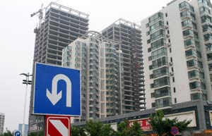 China's rich look abroad as home prices fall, others stay put