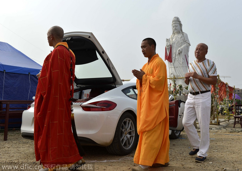 Monks hold consecration event for Porsche sports car