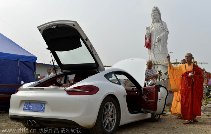 Monks hold consecration event for Porsche sports car