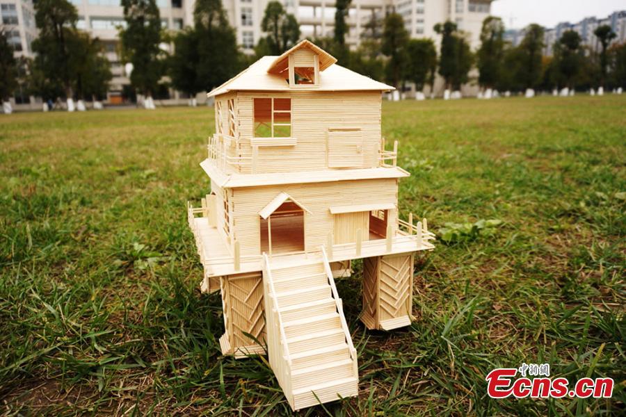 Students create 'villas' with small wooden sticks