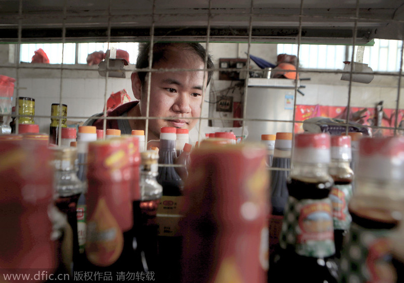 Armless young man runs his own store