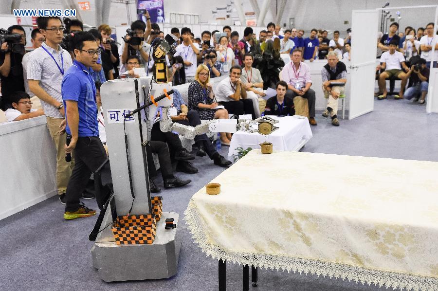 Robot 'Kejia' performs during 19th Robocup in China