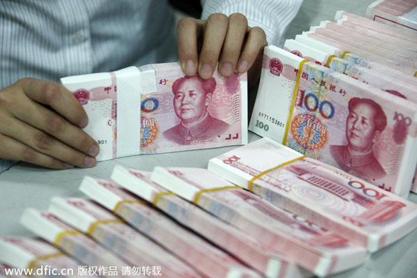 China's top bank regulator says bad loans surge