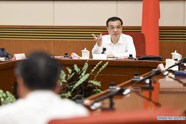 Difficulties won't stop reform, Li says