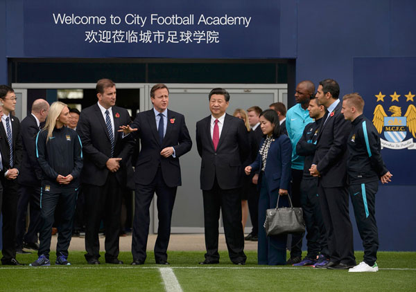 Chinese consortium buys stake in owner of Manchester City