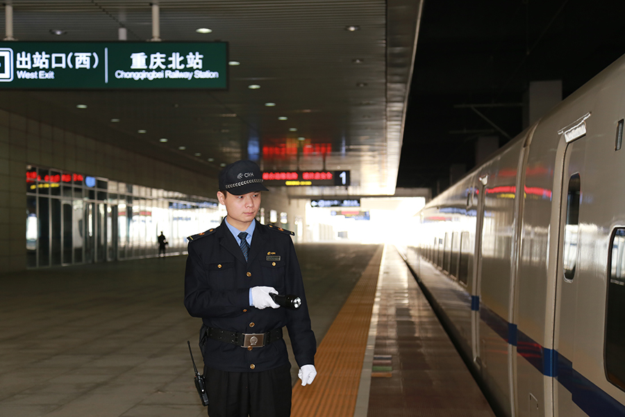 Attendants work in a standby bullet train