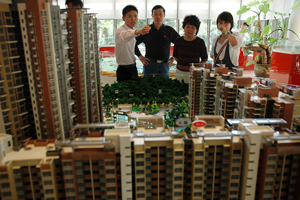 Guangdong probes firms giving credit to property buyers