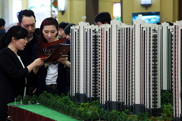 Shanghai, Shenzhen move to tame surging property prices