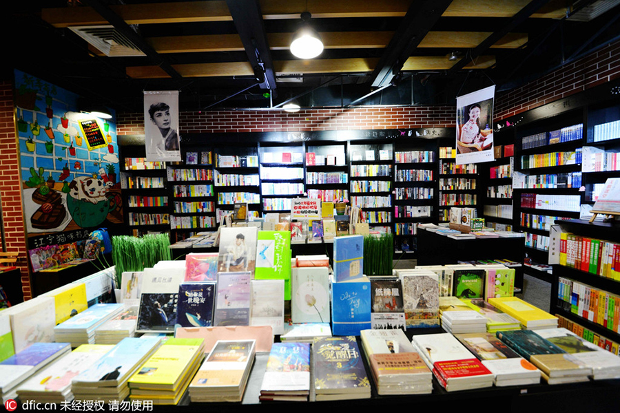 Purr-fect store: Read books as cats nap on your lap