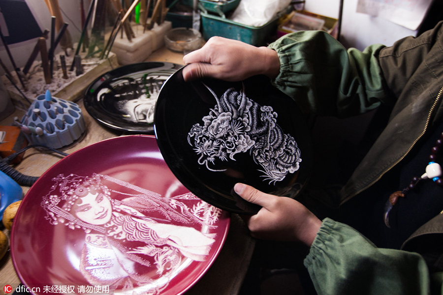Intricate pictures carved on porcelain