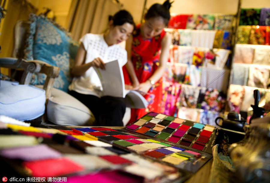 Young designer shares beauty in Qipao