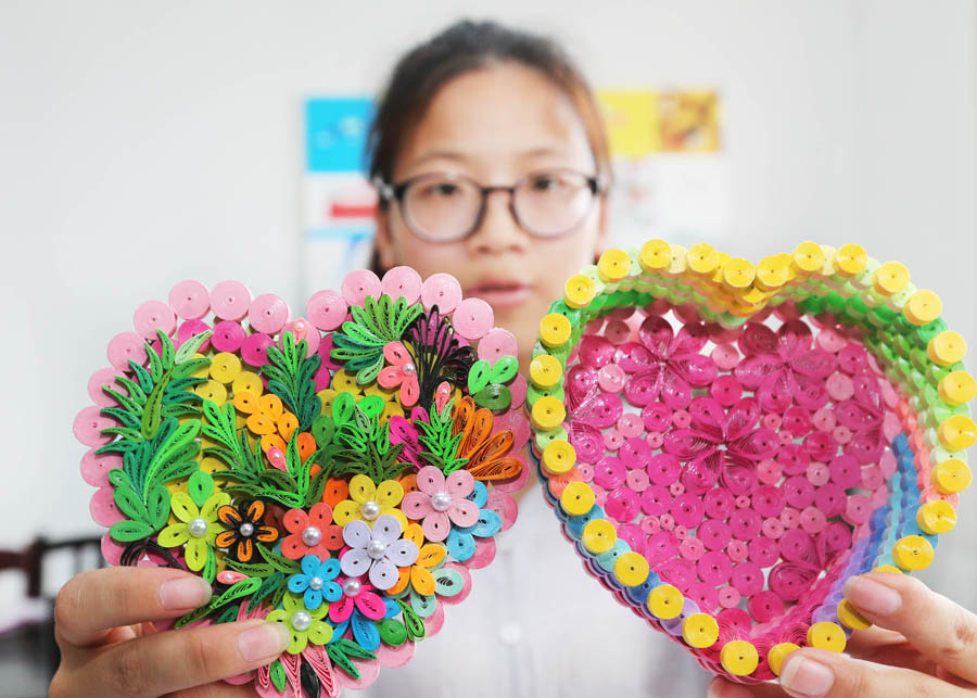 Labor of love: Graduate creates exquisite artwork with paper-rolling
