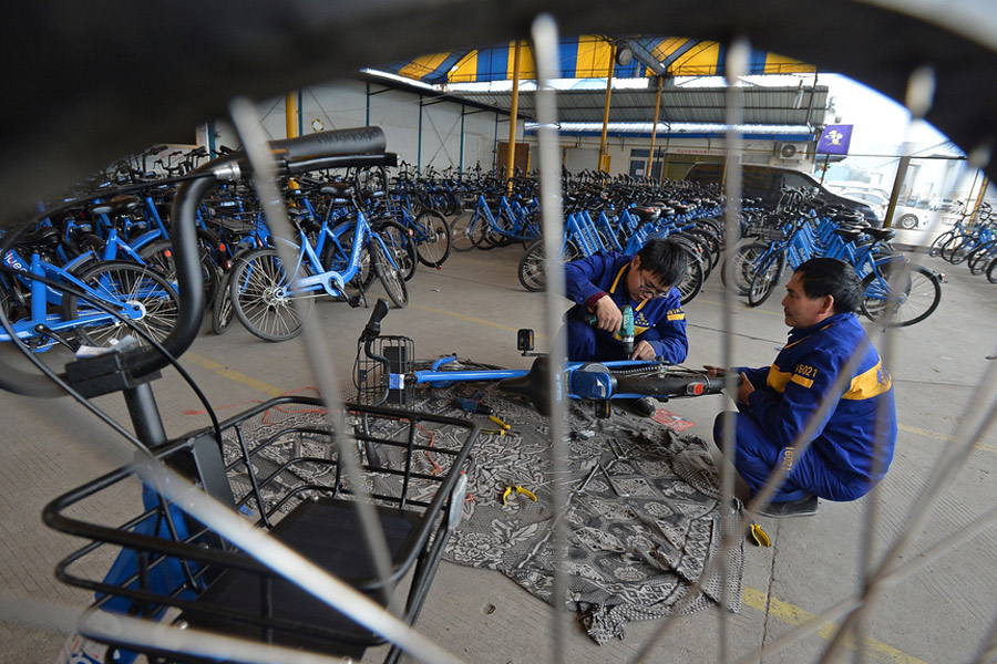 Repairmen race to get shared bikes back on the streets