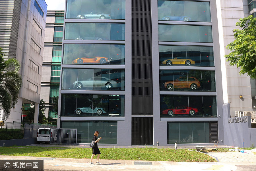 Singapore dealership sells luxury cars in 15-floor vending machine