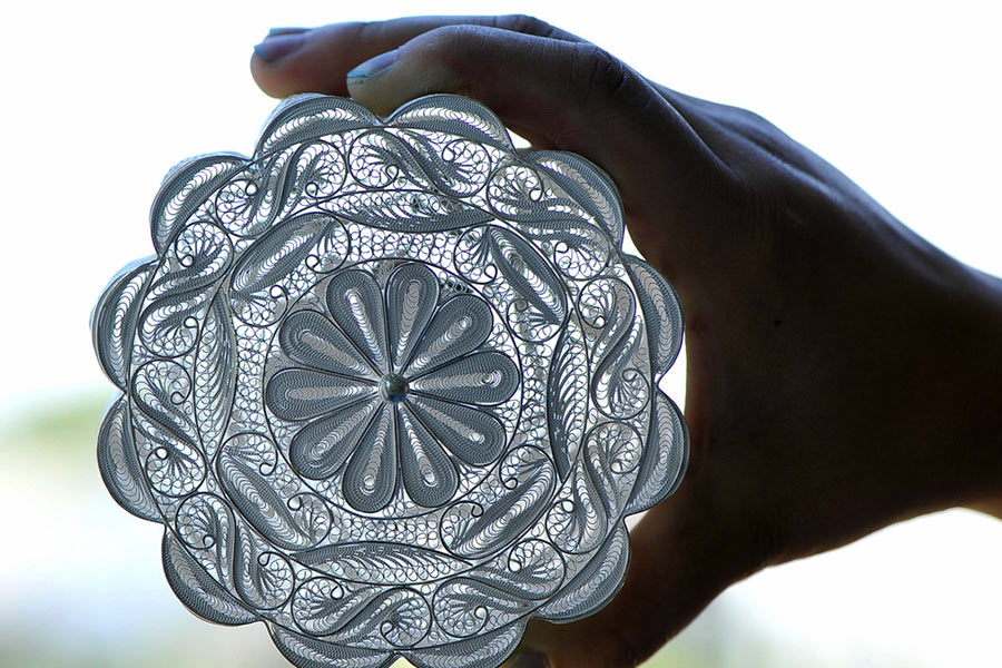 Hand-made silver mooncakes eagerly sought at market