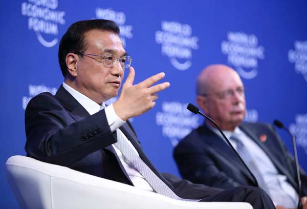 China premier vows opening to foreign investors