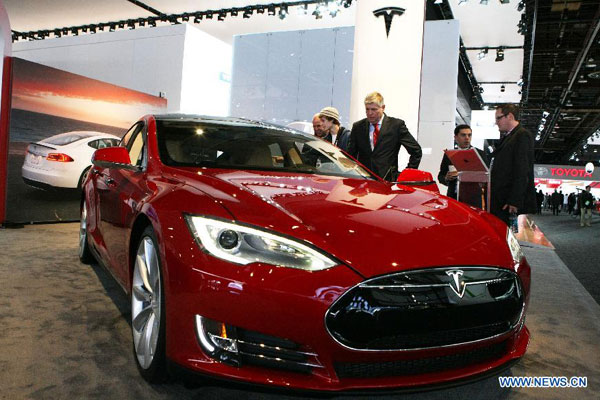 Tesla says to expand business in China