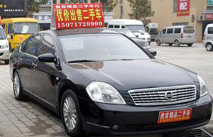 China mulls revising auto joint venture bar