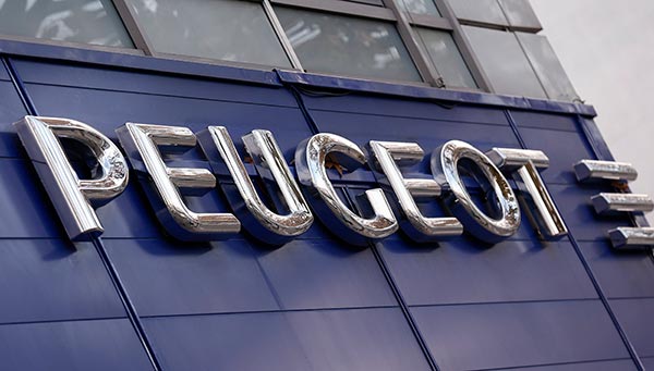 Peugeot family says to retain long-term PSA stake