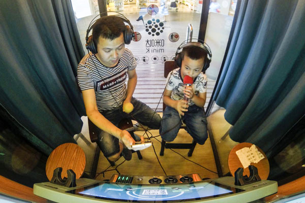 Mini karaokes hit China's starry-eyed spot