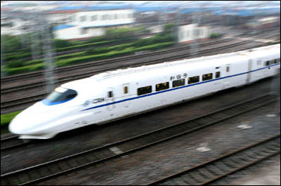 China's 1st high-speed train takes the rail