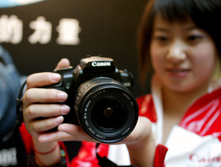 Canon relying on nation to get its flash back, says Yoshioka
